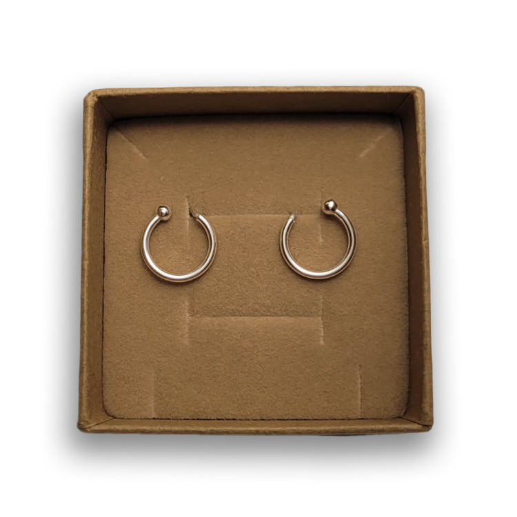 srebrne kolczyki koła asymetryczne.png